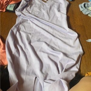 long fitted maxi dress a size medium with a slit at the bottom